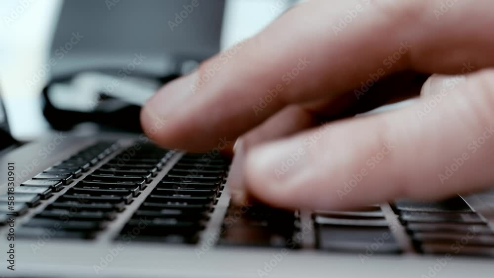 Man's hands typing on keyboard, journalist writing new article. Security in banking system, developer writing code.