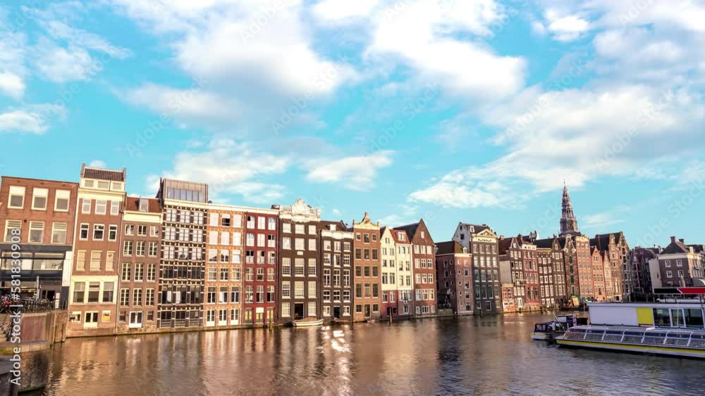 Amsterdam Netherlands time lapse 4K, city skyline timelapse at Damrak canal waterfront Amsterdam Netherlands time lapse 4K, city skyline timelapse at Damrak canal waterfront