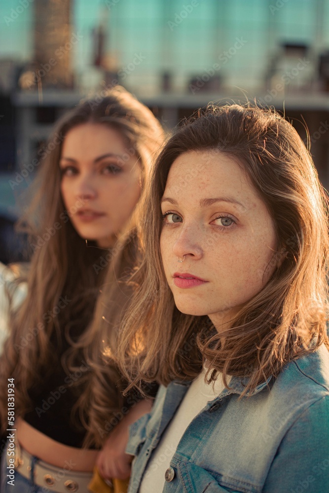 Hispanic girls dressed in casual clothes, posing outdoors on a sunny day, the concept of beauty