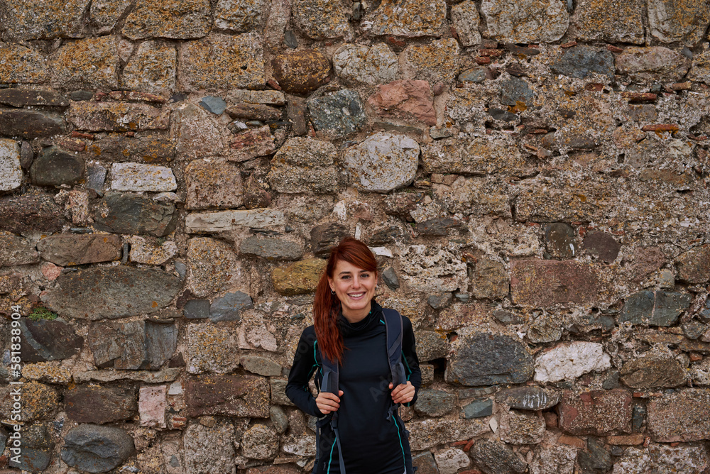 Portrait of a smiling ginger hiker