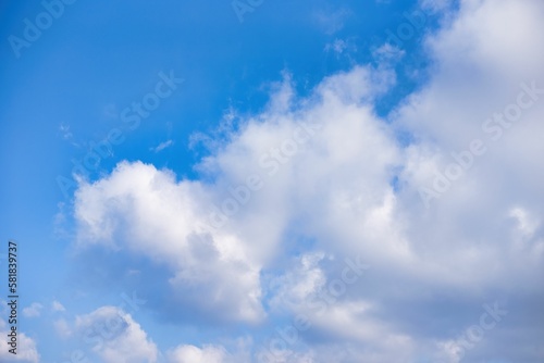 Beautiful blue crystal sky with white clouds that look like silk.