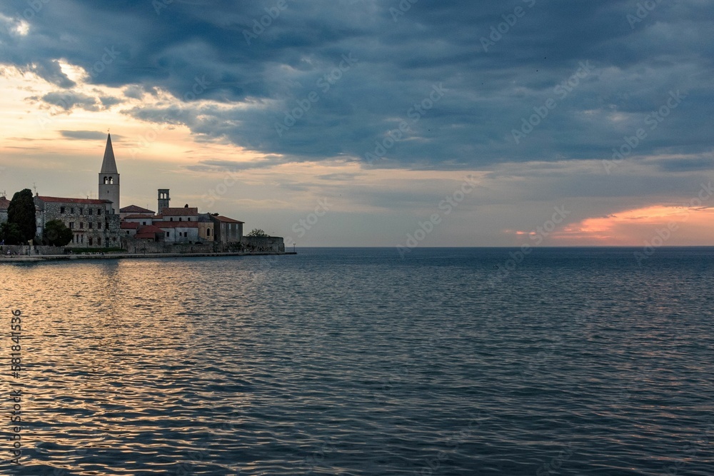 Beautiful view of a cloudy sky over the coast of the Adriatic sea in Porec, Croatia