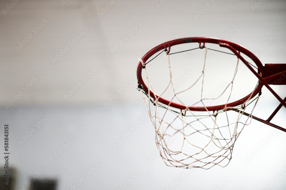 basketball hoop in the gym. Slow motion of a basketball hoop during a workout. basketball hoop, indoor sports arena. basketball hoop, close up