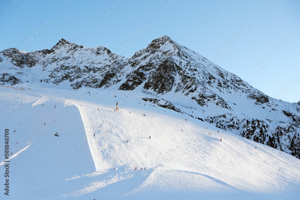 Beautiful view of a tall snowy mountain peak under a clear sky at the Kuhtai ski resort in Austria