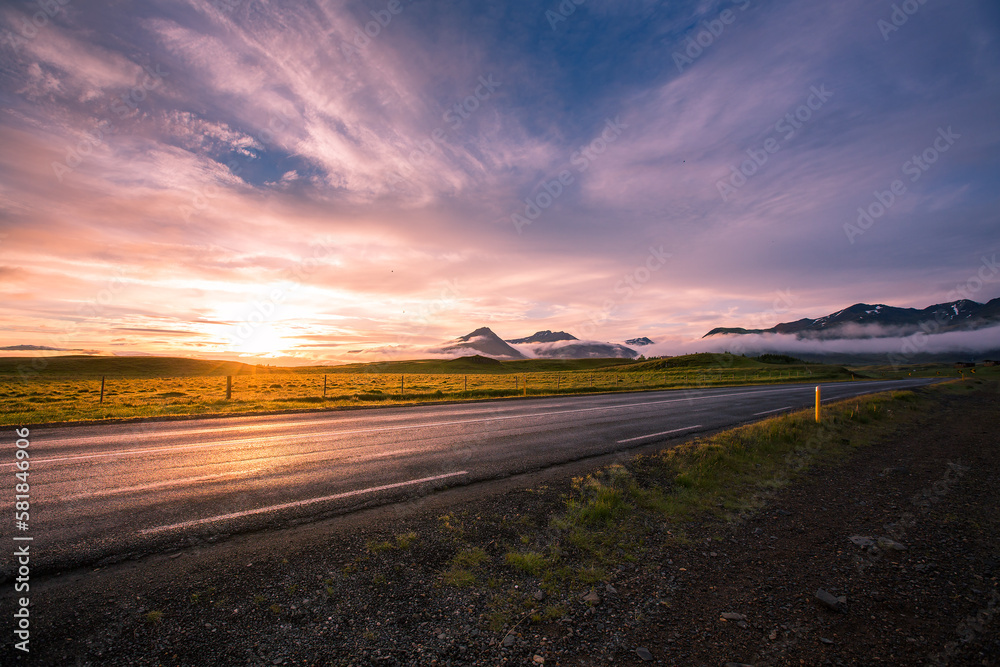 Sunset in Iceland with road, traveling in Iceland is amazing, beautiful colorful view