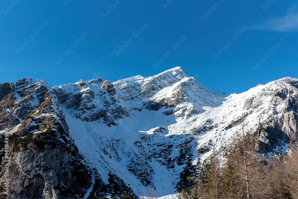 Scenic view of the snow-capped peak of Mala mojstrovka mountain in the Julian alps, Slovenia