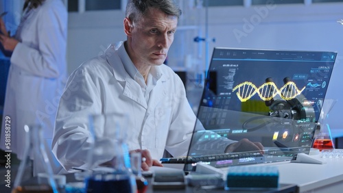 DNA lab scientist studying human genome structure on holographic screen, medical research