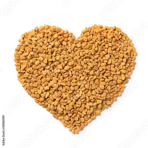 Fenugreek seeds in heart shape isolated on white background
