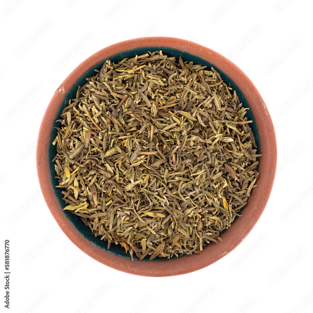 Portion of organic thyme leaf in a small terracotta bowl on a white background top view. Portion of organic thyme leaf in a small terracotta bowl on a white background top view.