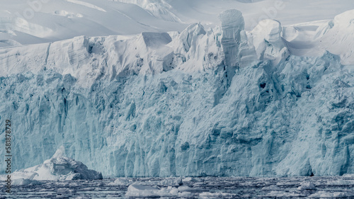 Huge Tall Blue Glacier Ice Calving Landscape Shot in Antarctica
