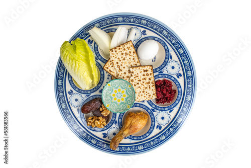 Symbolic meal (matzah, vegetables, nut date mix, bitter herbs, egg) for Passover (Pesach) Seder Plate. Traditional Seder Plate on white background.