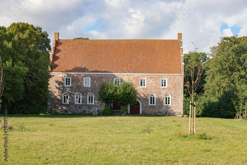 Old historic brick building in Aasted Denmark - The medieval castle Østergaard - The place is first mentioned in 1408, when Queen Margrethe I (1353-1412) was on a journey in Jutland.