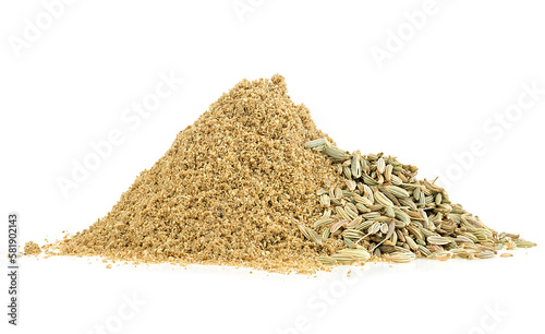 Pile of ground fennel and fennel seeds isolated on a white background