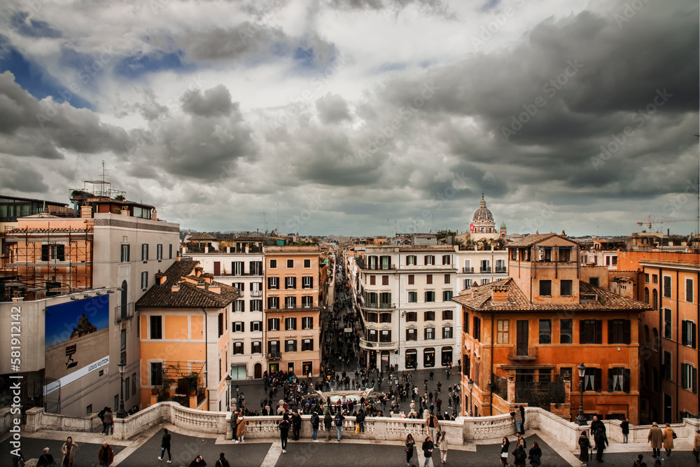 Panorama of Rome photographed from the upper part of the Spanish Steps. In the centre, the famous shopping street: Via Condotti