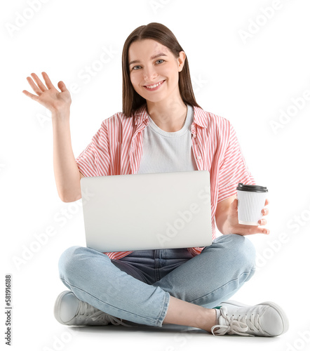 Sitting young woman with la...