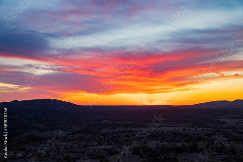 Fototapeta Naklejka Na Ścianę i Meble -  Sunset landscape of Wichita Mountains National Wildlife Refuge