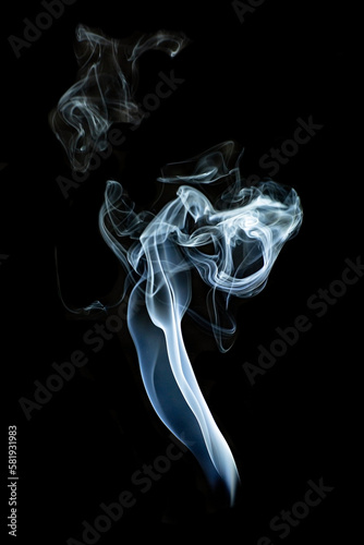 Colored smoke isolated on  black background. Abstract ink texture