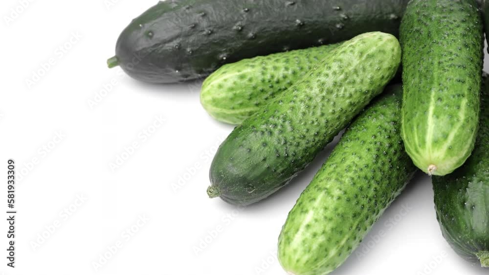 Cucumber stack fresh agricultural harvest summer vitamin healthy food rotation closeup isolated Cucumber stack fresh agricultural harvest summer vitamin healthy food rotation closeup isolated