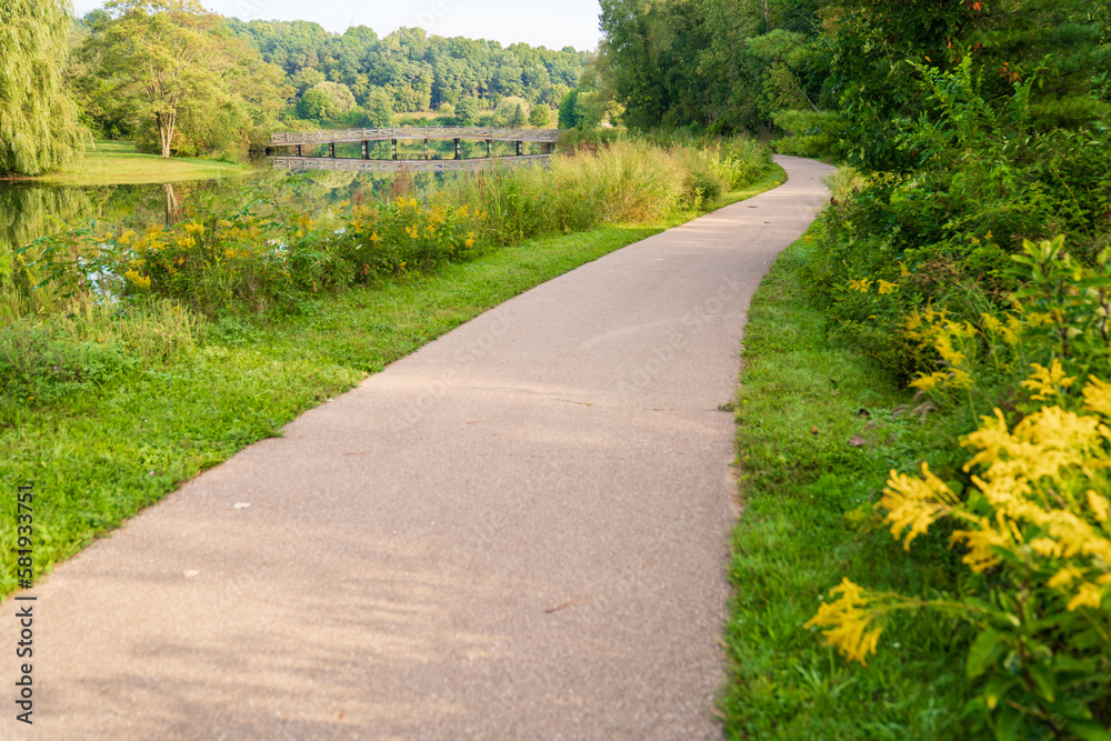 Outdoor Walking Path in a Park During Summer Outdoor Walking Path in a Park During Summer