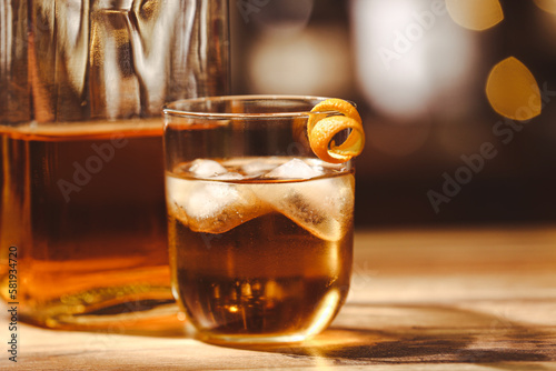 Whiskey glass with ice and ...