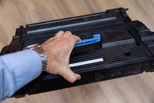 Large replaceable laser cartridge with toner for laser printers. Recycling and recycling of cartridges.