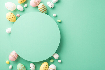 Easter celebration concept. Top view photo of turquoise circle and colorful easter eggs on isolated teal background with copyspace