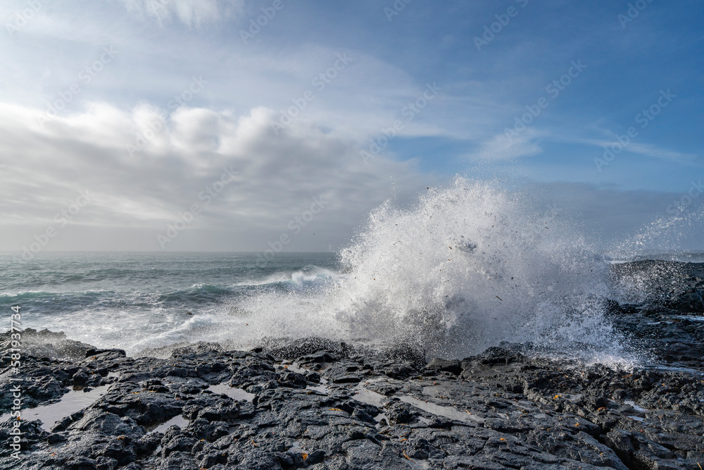 Black rocks on the coast of Iceland with big waves Black rocks on the coast of Iceland with big waves