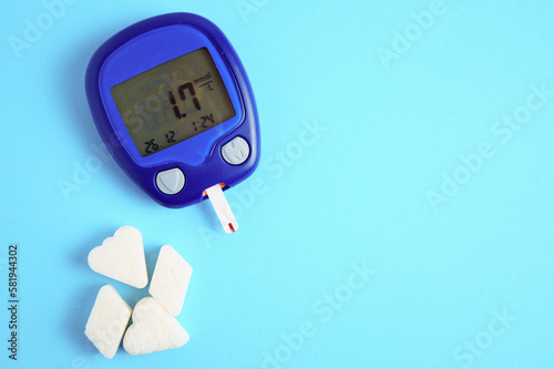 Фотография The meter is insulated on a blue background