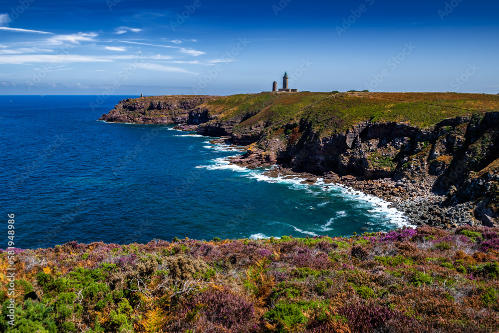 Cliffs At Atlantic Coast With Ancient Lighthouse At Cap Frehel In Brittany, France; Phare du Cap Frehel