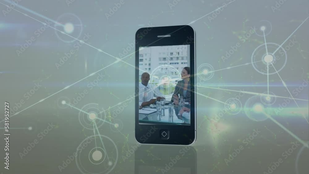 Animation of connected dots with lines over diverse businesspeople discussing reports in cellphone Animation of connected dots with lines over diverse businesspeople discussing reports in cellphone