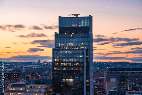 Aerial view of Colmore row Birmingham skyline with skyscraper on beautiful sunset  