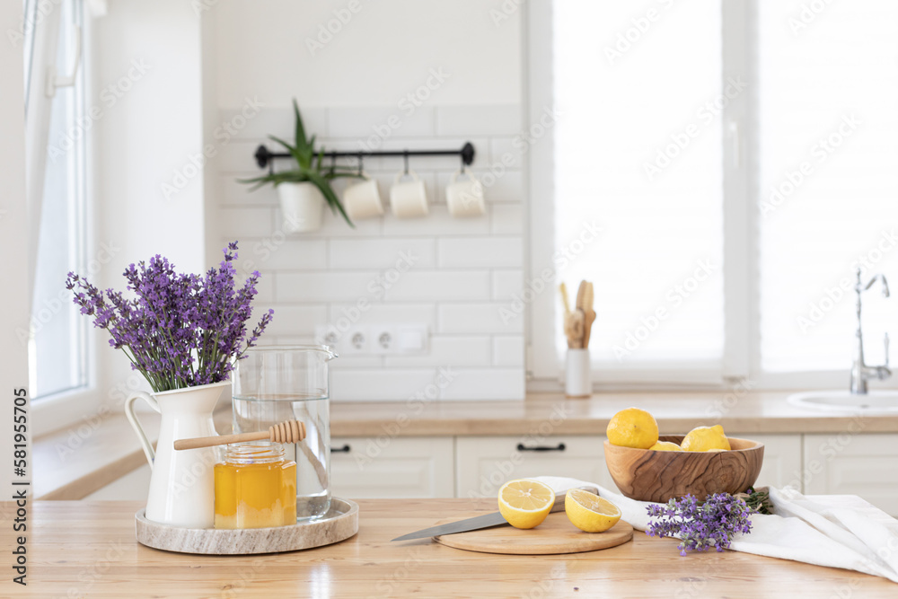Making a refreshing summer drink. Preparing lemonade in the kitchen. Healthy food concept Making a refreshing summer drink. Preparing lemonade in the kitchen. Healthy food concept