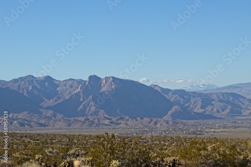 Rugged mountains rise above the desert valleys of Anza Borrego Desert State Park in San Diego County, California photo