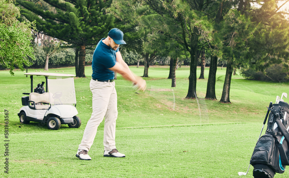 Obraz premium Golf, stroke and hobby with a sports man swinging a club on a field or course for recreation and fun. Golfing, grass and training with a male golfer playing a game on a green during summer