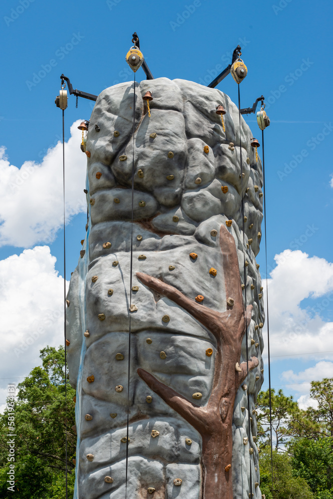 A mobile artificial rock free climbing wall with handhold and foothold