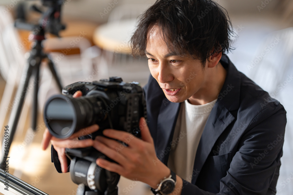 Obraz premium カメラマン・男性・動画