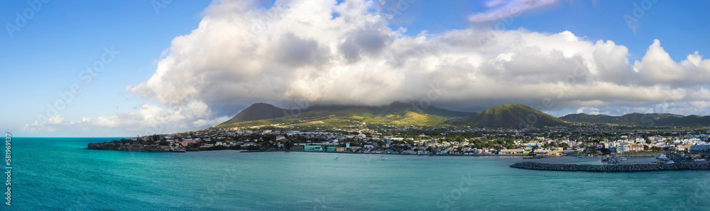 Saint Kitts and Nevis Basseterre scenic panoramic shoreline from cruise ship on Caribbean vacation.