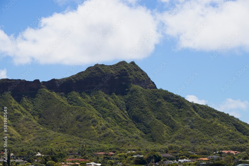 Diamond Head, a volcanic cone, that is a notable landmark visible from Honolulu's famous Waikiki neighborhood