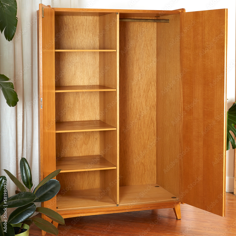 Vintage 1960s oak wood armoire. MidCentury Modern furniture. Interior view with large