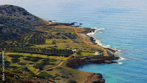 Agios Dionysios (Xepapadeas) beaches. Only beach in Mirabello area that faces purely east and is typically calm. Adjacent to Xepapadia, you can find the picturesque chapel of St. Diony. Crete, Greece