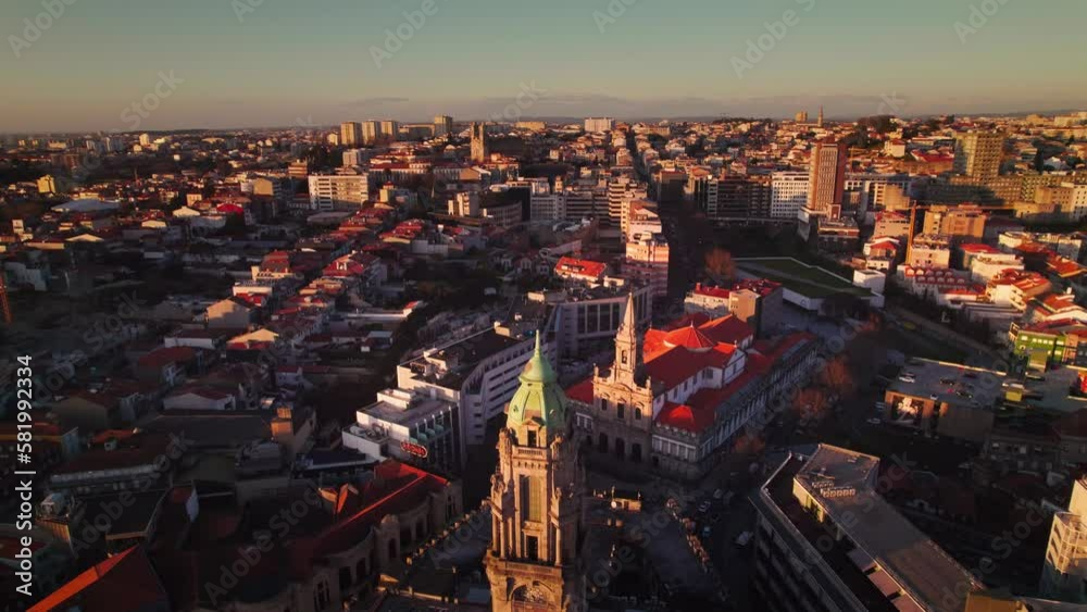 Drone Shot of Câmara Municipal do Porto, Porto's City Hall located in the city center.  It is a neoclassical 1900s building featuring a black-marble entrance hall and a clocktower with city views.