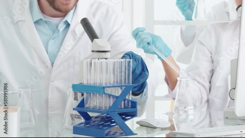 scientist examining liquid samples in the laboratory.