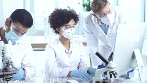 image a group of scientists working in a laboratory.