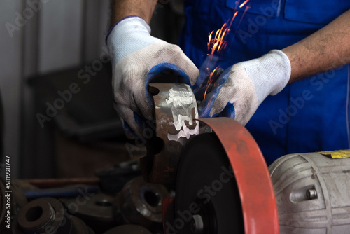 The mechanic was grinding the brake discs and sparks flew out.