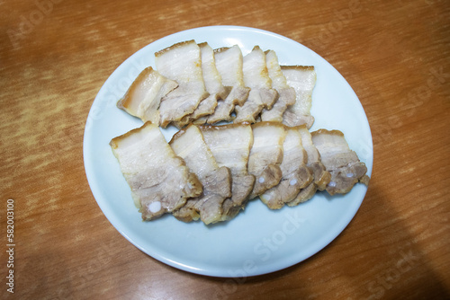 Delicious boiled pork slices on a plate.