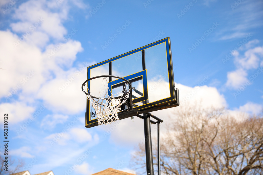 Basketball hoop outdoor showing backboard on the street sport showing fun sport competition with at home showing the importance of exercise and team recreation Basketball hoop outdoor showing backboard on the street sport showing fun sport competition with at home showing the importance of exercise and team recreation