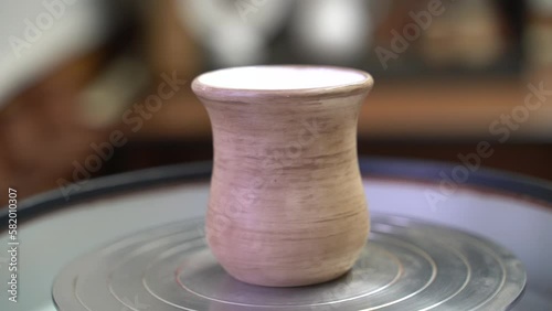 Ceramics, a ceramic product made with their own hands on a potter's wheel, a mug.