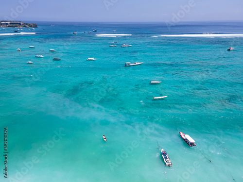 Aerial view of tourist speedboat anchored at Nusa Lembongan. One of travel destinations close to Bali island, Indonesia.