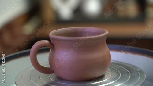 Ceramics, a ceramic product made with their own hands on a potter's wheel, a mug.