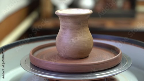 Ceramics, a ceramic product made with their own hands on a potter's wheel, a mug.